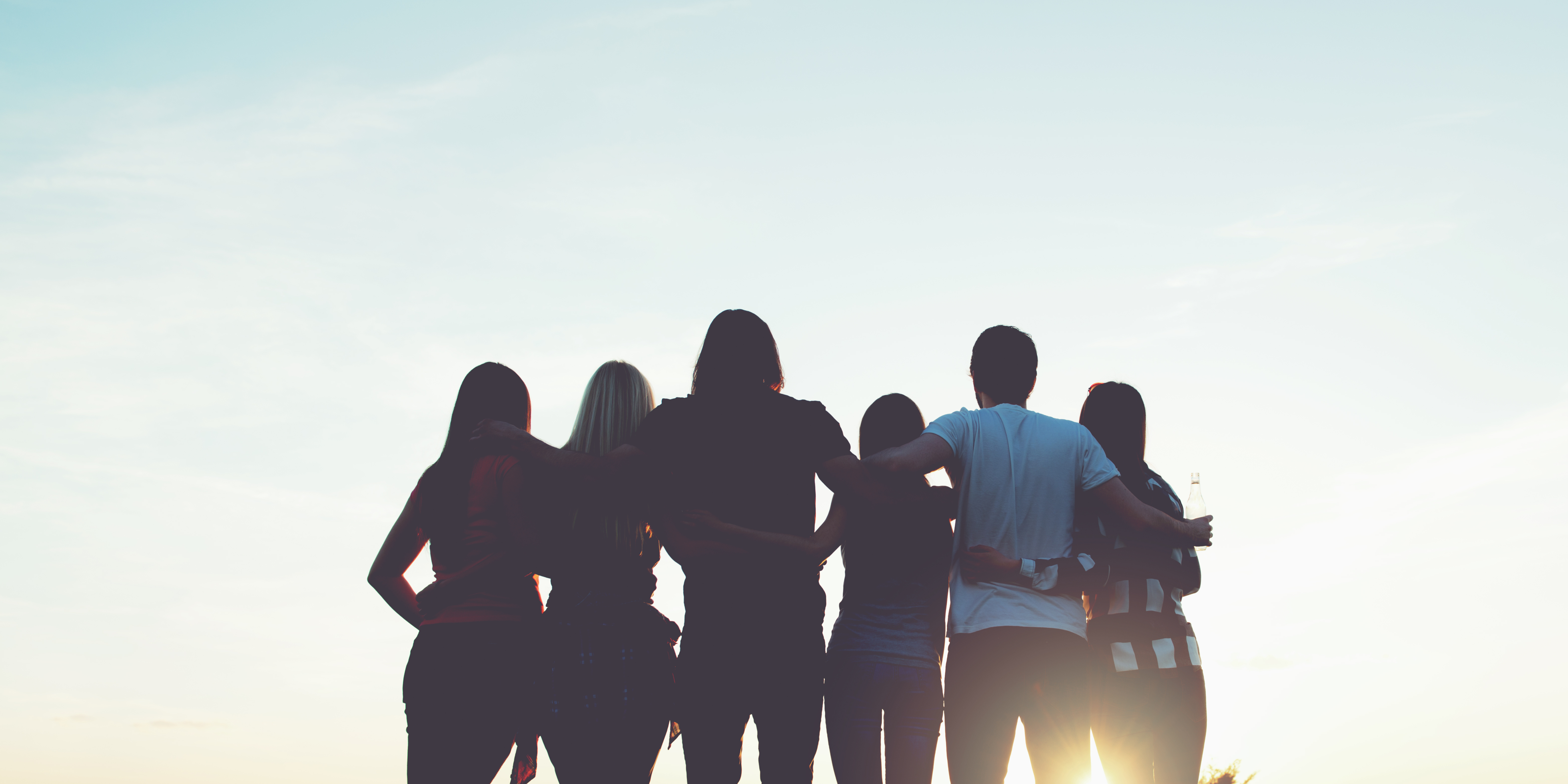 groups hero people sitting on chair in front of table while holding pens during daytime